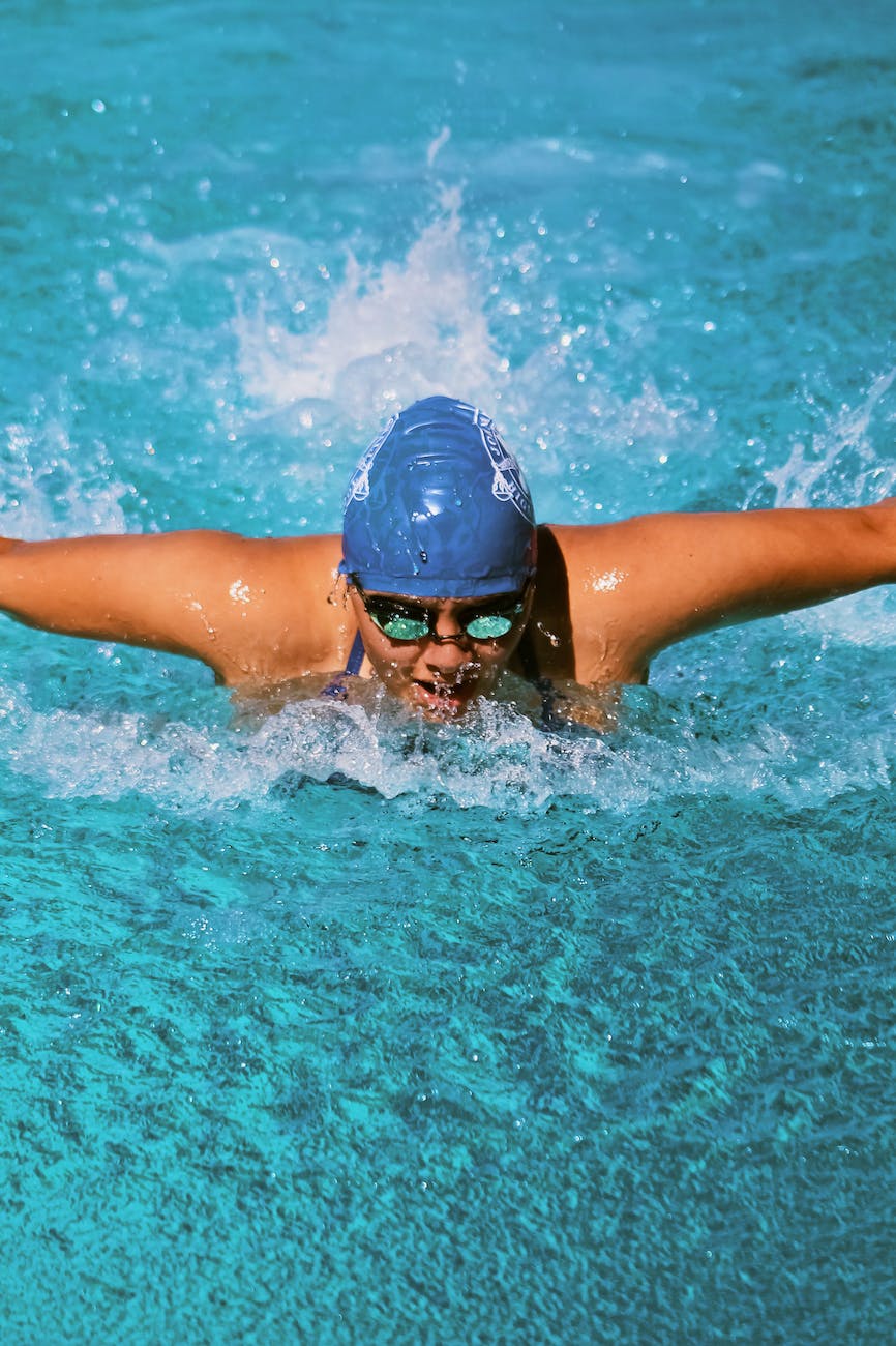 person in swimming goggles in water